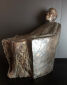 Hanne Varming: "Den altvidende". Figur af brunt patineret bronze. Sign. H. 49. D. 50.